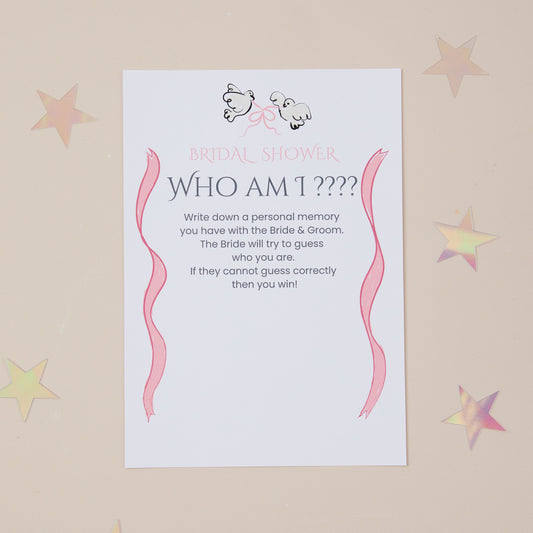 Bridal Shower Game called who am It is a game card for a hen do bridal shower. Guest with encouraged to write down a personal memory, and bride to be has to guess who they think wrote the memory. There are 2 doves at the top of the game card, joined loosely with a pink ribbon. There are soft strands of pink ribbon that are on both sides of the game card.